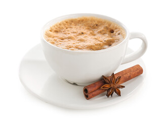 Cup of delicious espresso with spices and saucer on white background