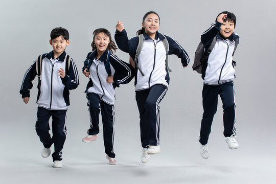 Studio shot of cheerful students