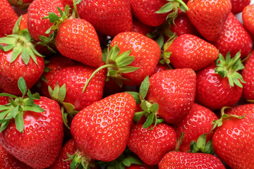 Texture of fresh strawberries as background, closeup