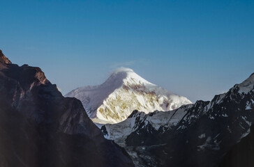 view to snow covered Diran Peak mountains from Karimabad, Karakorum Highway