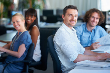Portrait, workspace and business people in teamwork, coworking and creative startup or agency in office. Happy, diversity and face or group of women, men or designer at desk and working together