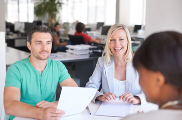 Documents, interview and happy business people, meeting clients and hiring or recruitment in creative office. Paperwork, resume or cv with woman and partner in HR talking to designer for onboarding