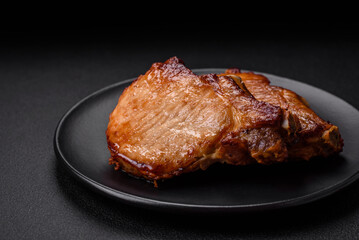 Delicious juicy pork or beef steak with salt, spices and herbs