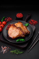 Delicious juicy pork or beef steak with salt, spices and herbs