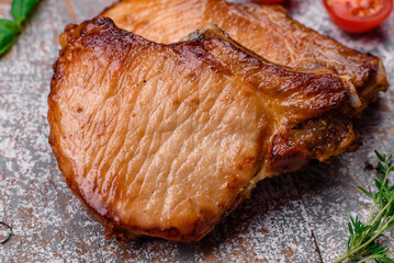 Delicious juicy pork or beef steak with salt, spices and herbs