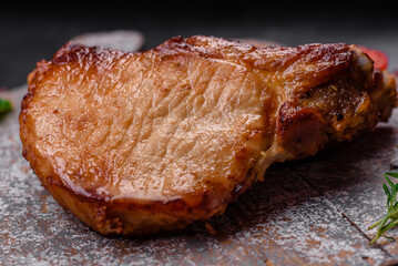 Delicious juicy pork or beef steak with salt, spices and herbs