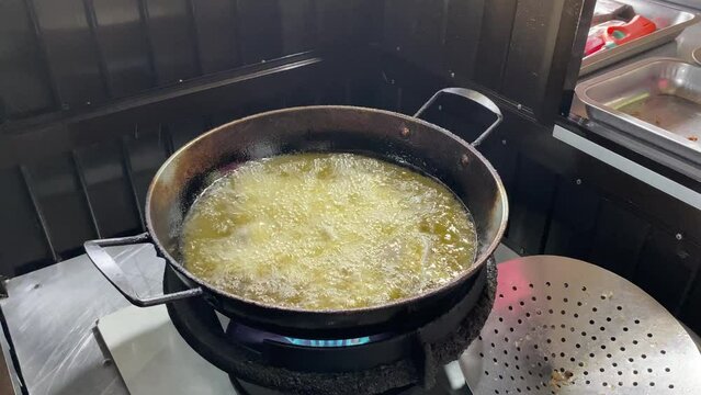 Traditional food from South Sumatra, Indonesia. This fish-based food is very popular.  Savory Indonesian fish cake served with vinegar sauce and cucumber slices.