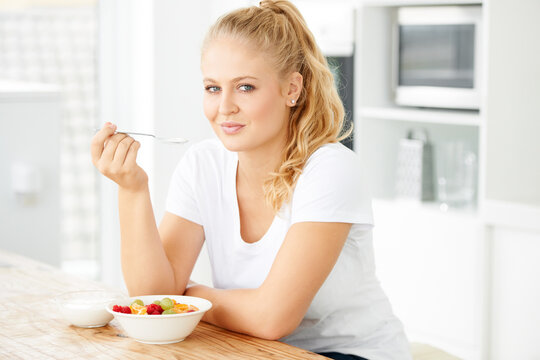 Fruits, Morning And Portrait Of Eating Woman With Healthy Lunch Or Breakfast Meal Or Diet In Home Kitchen For Wellness. Nutrition, Health And Vegan Person Smile And Happy For Salad And Self Care