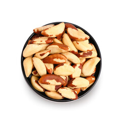 Plate of tasty Brazil nuts on white background