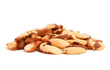 Heap of delicious Brazil nuts on white background