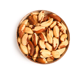 Bowl of delicious Brazil nuts isolated on white background