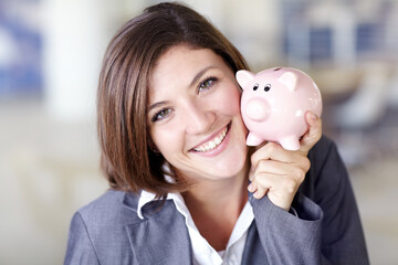 Happy, finance and portrait of a woman with a piggybank for savings, budget and coins. Smile, money and face of an accounting manager with a tool for insurance, investment profit and cash at work
