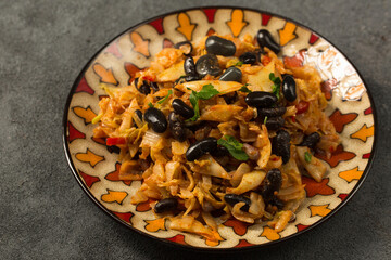 Cabbage and bean stew on a plate