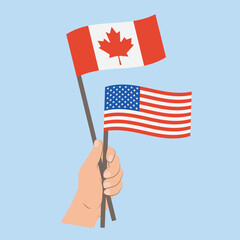 Flags of Canada and USA, Hand Holding flags