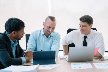 Group of diverse business people discussing a project in a meeting for analysis graph company financial.