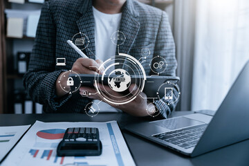 Person typing laptop computer and tablet with SDK icon on virtual screen. SDK Software development kit programming language technology concept in office.