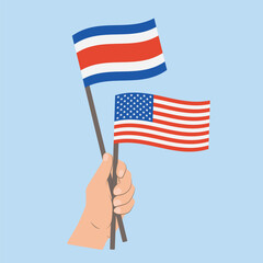 Flags of Costa Rica and USA, Hand Holding flags