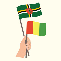 Flags of Dominica and Guinea, Hand Holding flags