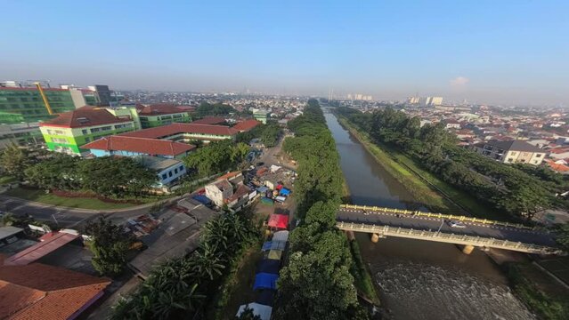 BKT Aerial Drone low over trees - banjir kanal timur - east flood canal