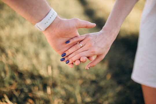 hands of a young couple