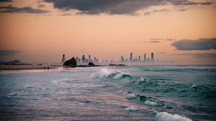 The sun rises over Currumbin with the Gold Coast in the background