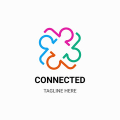 CONNECTED HUMAN LOGO IN COLOURFUL PUZZLE SHAPE
