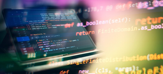 Notebook closeup photo. CSS, JavaScript and HTML usage. Monitor closeup of function source code....