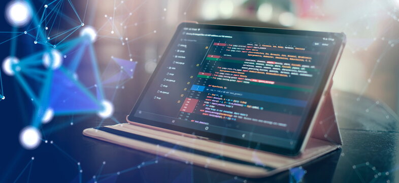 Notebook closeup photo. CSS, JavaScript and HTML usage. Monitor closeup of function source code. Abstract IT technology background. Software source code.