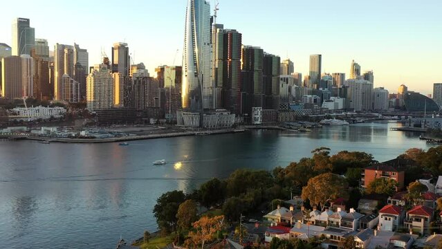 Tall modern urban Barangaroo towers of Sydney city CBD in aerial fly as 4k.
