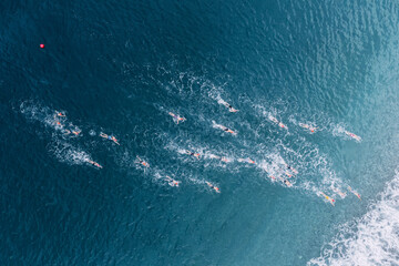 Aerial view of athletes at open water sea swimming competitions