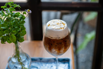 A Fresh Glass of ice milk Chocolate on top Whipped Cream, Sweet Cocoa ice in Beautiful glass Sweet...