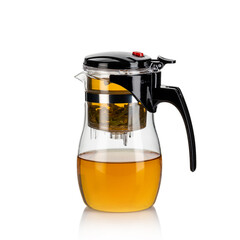 Isolated Teapot with tea. On white.