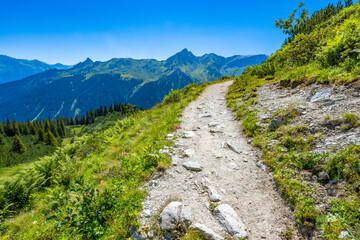 Fototapeta na wymiar Path in the Brandnertal, State of Vorarlberg, Austria, Rätikon Mountains.