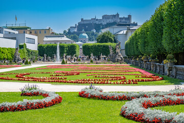 The Mirabell Garten in the City of Salzburg, Austria, with the Castle Mirabell and the Fortress Hochensalzburg.