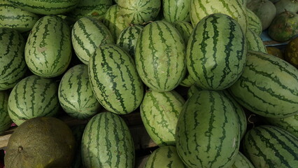 Piles of watermelons in traditional markets, big and fresh watermelons