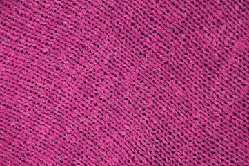 violet unusual texture.knitted purple sweater close up. handmade concept	