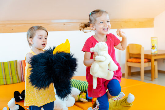 Children playing together in Kindergarten having loads of fun
