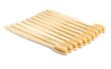 Many bamboo toothbrushes on white background