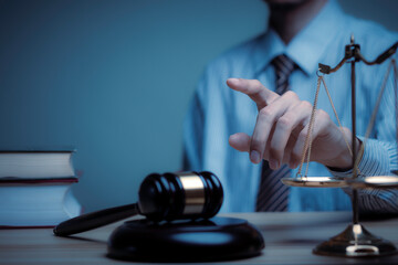 Lawyer's hand concept Justice  with Judge gavel, Businessman in suit or Hiring lawyers in the...