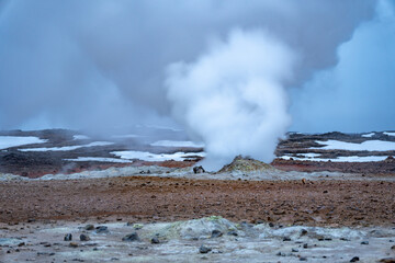 steam geyser on thermal active area, iceland