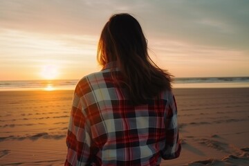 Blonde haired girl covered with a cloth plaid shirt standing peacefully at the beach and looking into the ocean , generative AI