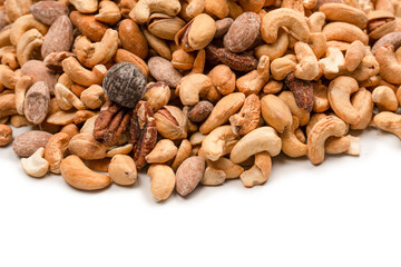 A group of almonds, pistachios, walnuts, macadamia, cashews.