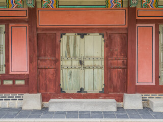 Fototapeta na wymiar The closed internal wooden door in Gyeongbok Palace in seoul