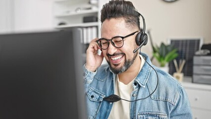 Young latin man business worker having video call at office
