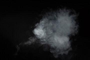 Smoke effect on a black background in a studio