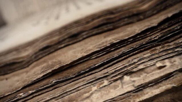 Slider macro view of ancient papyrus,archival manuscripts.Medieval library tomes