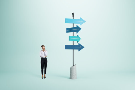 Right decision and choice concept with pensive businesswoman looking at signpost with blue arrows in different direction on abstract light background