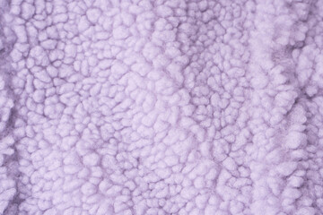 Purple fur texture as a background.