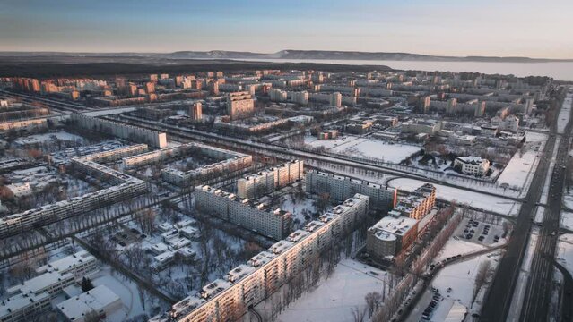 Aerial view. Winter panorama of the city of Tolyatti in the Samara region. Snow-covered streets of a provincial and industrial Russian city.