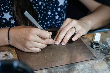 making silver ornament by handcraft